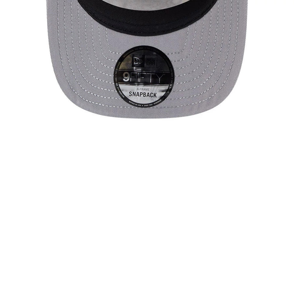 LA Lakers NBA Light Beige New Era 9FIFTY A-Frame Snapback Adjustable Cap, underside view showing a grey visor with a black undervisor and a 9FIFTY A-Frame Snapback size sticker in the centre, capturing the stitching details.