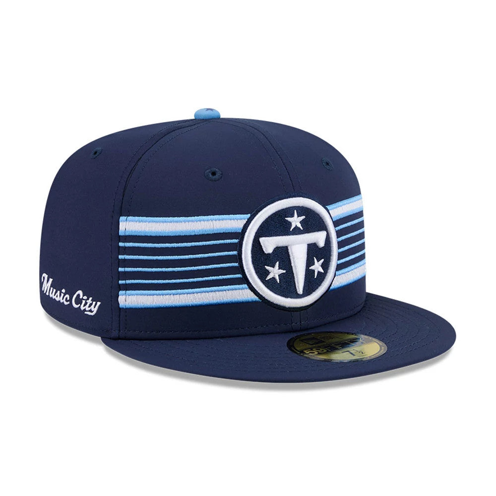 Tennessee Titans NFL Rivalry 2026 Dark Blue New Era 59FIFTY Fitted Cap, front view showing the raised embroidered Titans logo in white and light blue on the front panel, dark blue flat visor, and gold 59FIFTY size sticker.