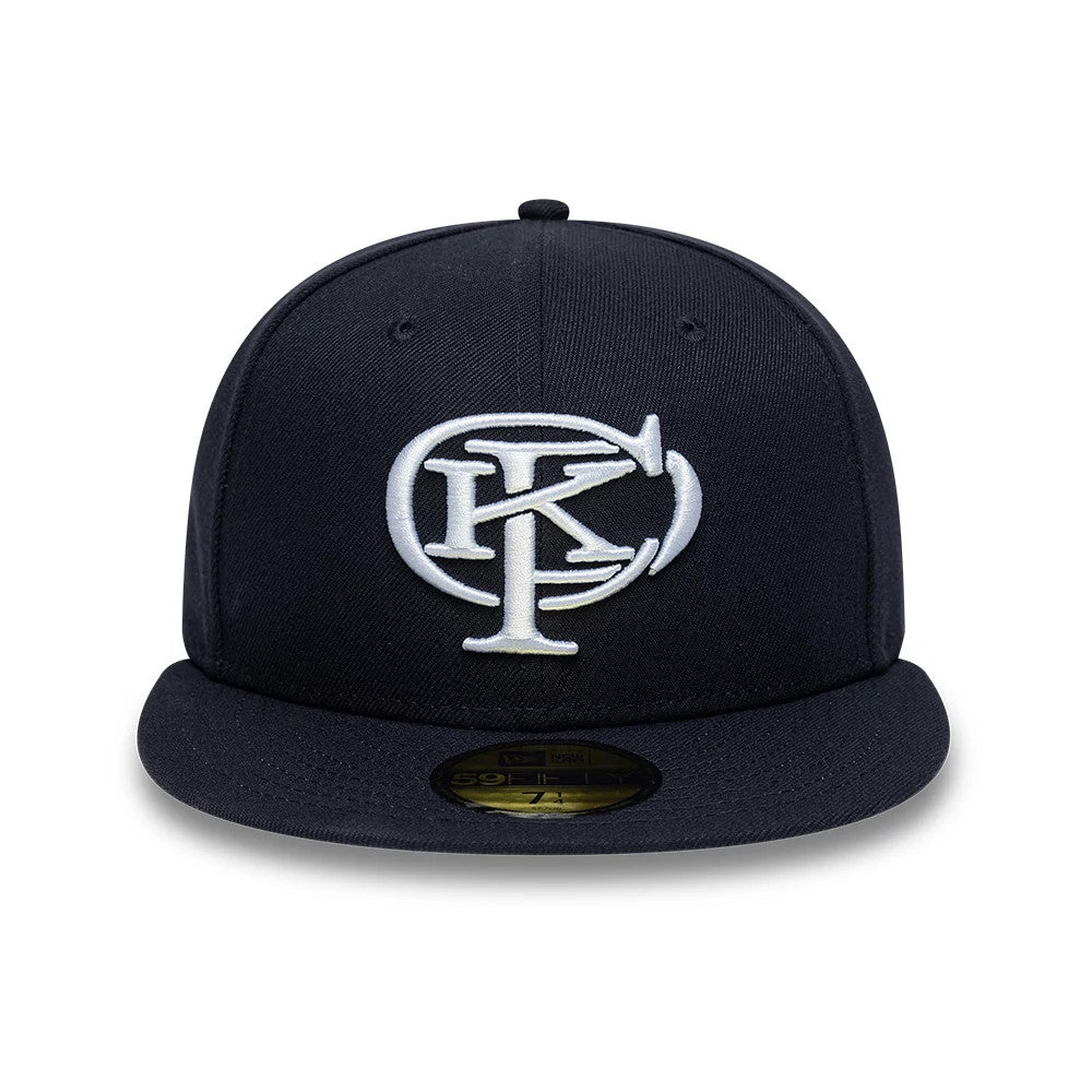 Gettomasa X New Era Navy 59FIFTY Fitted Cap, front view showing the raised white embroidered logo on the structured navy crown, with a flat visor and a gold 59FIFTY size sticker centred on the visor.