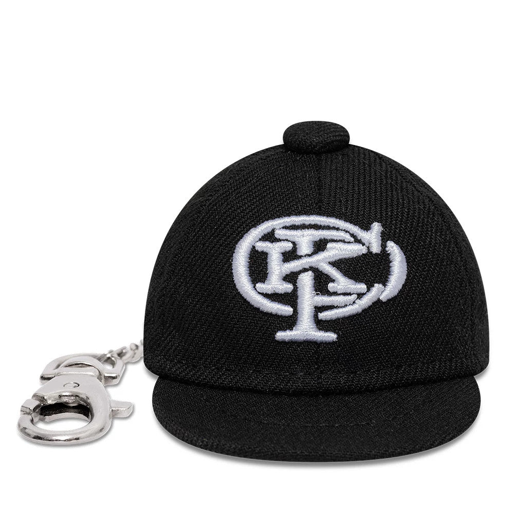 Gettomasa X New Era Black Key Chain, front view showing a mini cap design with a white embroidered logo on the black crown, a small top button, and a silver clasp attached by a short chain.