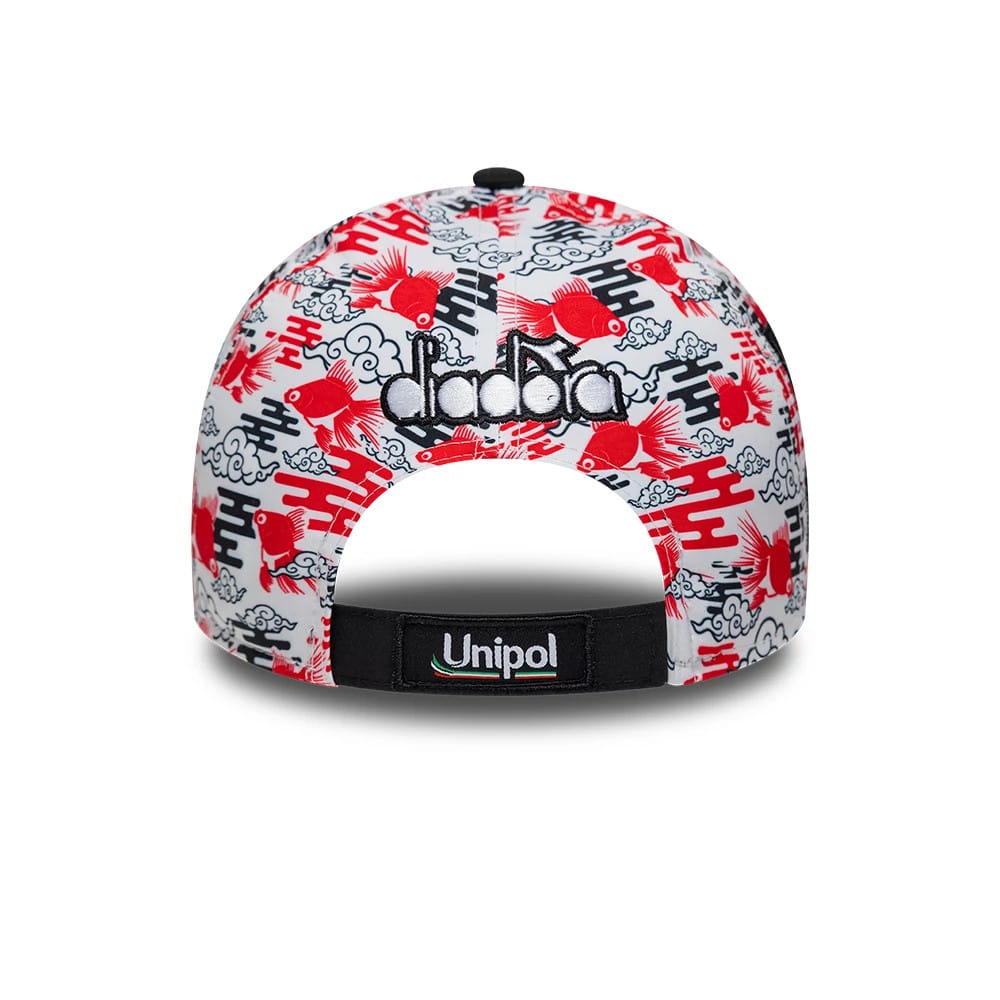 Ducati Motor Replica Francesco Bagnaia Japan Race Special All Over Print New Era 9FORTY E-Frame Adjustable Cap, rear view showing black Diadora lettering embroidered above the adjustable strap, with a colourful fish and wave pattern on the crown.