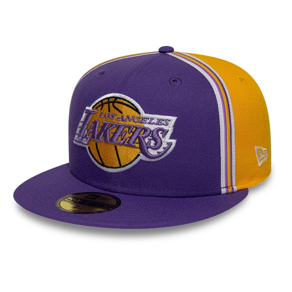 LA Lakers NBA Hardwood Classic Players Purple New Era 59FIFTY Fitted Cap, three-quarter view showing the purple and gold embroidered Lakers logo on the front panel, a flat purple visor with a gold 59FIFTY size sticker, and white side stripes.