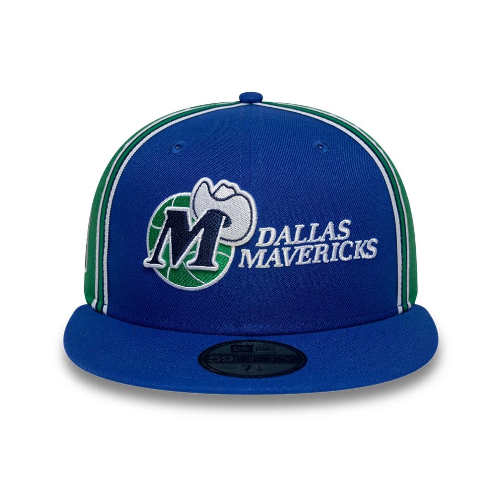Dallas Mavericks NBA Hardwood Classic Players Blue New Era 59FIFTY Fitted Cap, front view showing the large embroidered Mavericks logo on the structured blue crown, with white and green details and a 59FIFTY size sticker on the flat blue visor.