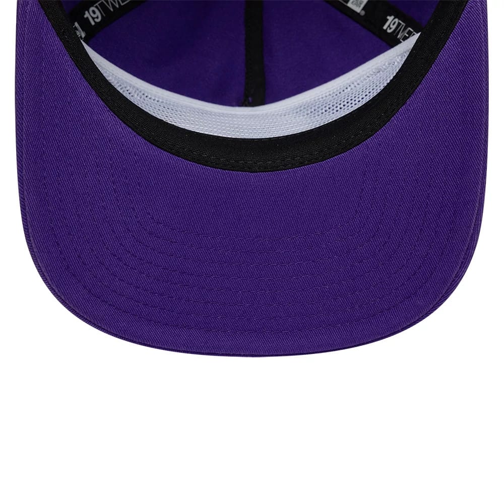 Utah Jazz NBA Hardwood Classic Purple New Era 19TWENTY Adjustable Cap, inside view showing the black sweatband, white mesh panel, and purple undervisor, with black taping featuring New Era branding running along the interior seams.