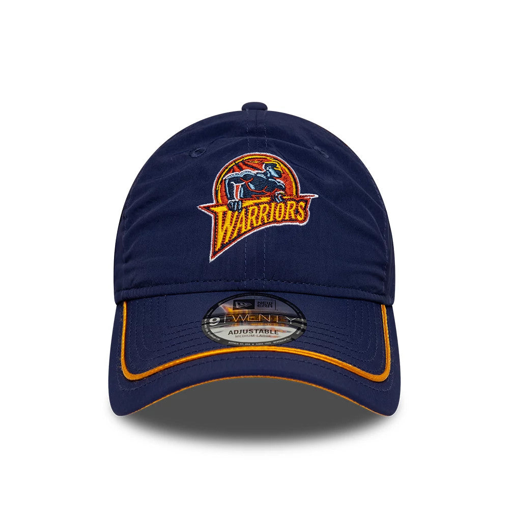 Warriors NBA Hardwood Classic Nylon Dark Blue New Era 9TWENTY Adjustable Cap, front view showing a retro Warriors logo embroidered in colours on the low-profile crown, with an orange trimmed visor and a 9TWENTY size sticker on the centre.