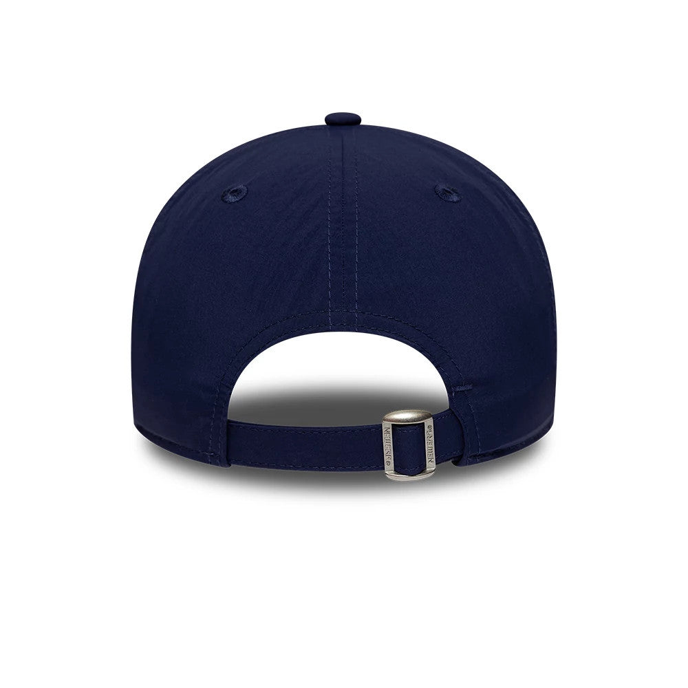 Warriors NBA Hardwood Classic Nylon Dark Blue New Era 9TWENTY Adjustable Cap, rear view showing the curved visor structure, an adjustable fabric strap with a buckle, and two eyelets on the dark blue back panels.