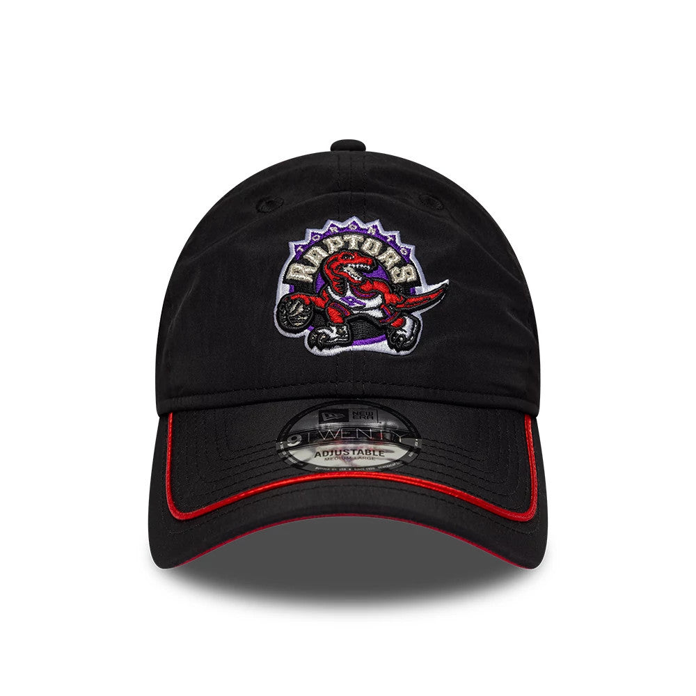 Toronto Raptors NBA Hardwood Classic Nylon Black New Era 9TWENTY Adjustable Cap, front view showing an embroidered Raptors logo on the black crown, red piping along the edge of the curved visor, and a clear 9TWENTY size sticker on the visor.