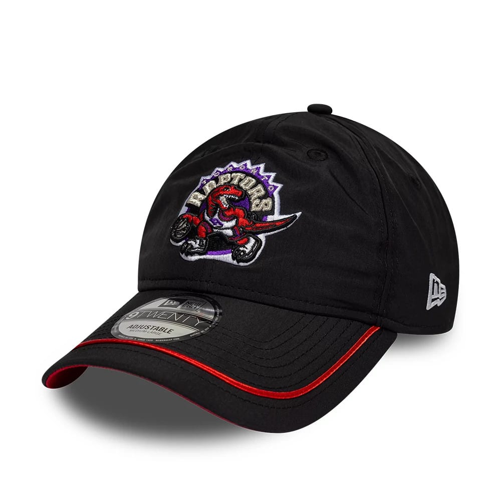 Toronto Raptors NBA Hardwood Classic Nylon Black New Era 9TWENTY Adjustable Cap, three-quarter view showing a raised embroidered red and purple dinosaur logo on the front panel, black curved visor with red trim, and a 9TWENTY size sticker.