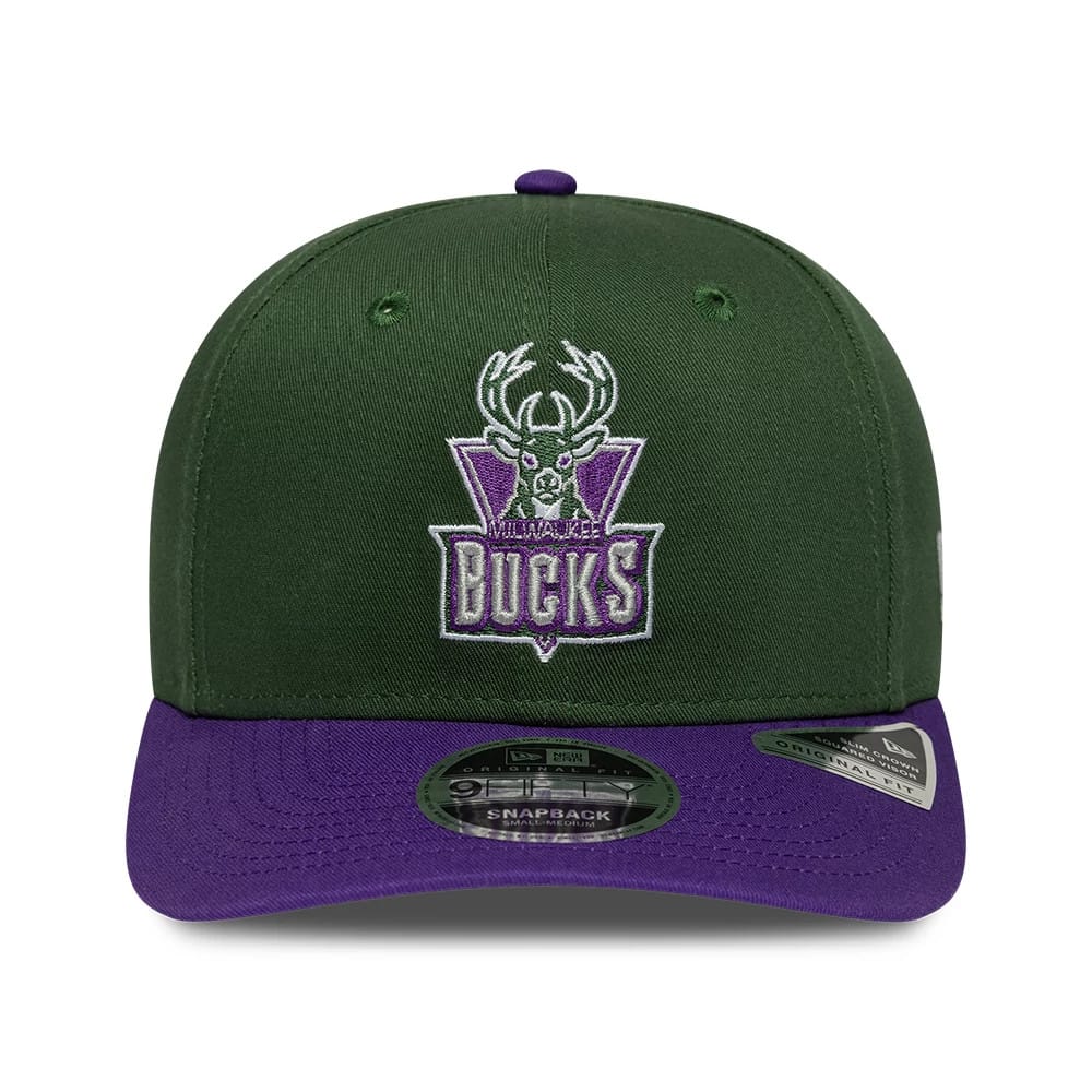 Bucks NBA Hardwood Classic Dark Green New Era 9FIFTY Snapback Adjustable Cap, front view showing the raised embroidered Milwaukee Bucks logo in white and purple on the green crown, with a flat purple visor and a 9FIFTY size sticker.