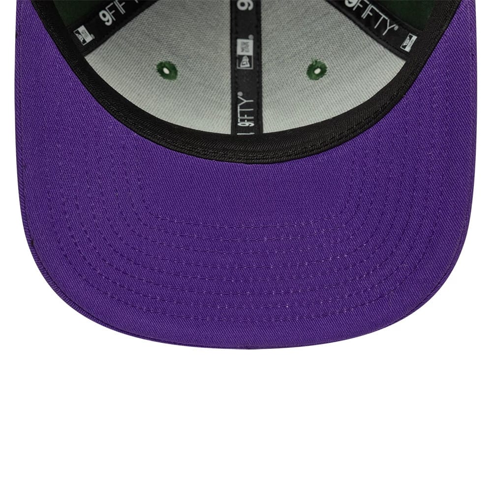 Bucks NBA Hardwood Classic Dark Green New Era 9FIFTY Snapback Adjustable Cap, inside view showing a dark green undervisor, black 9FIFTY taping along the seams, and green eyelet accents on the structured grey interior.