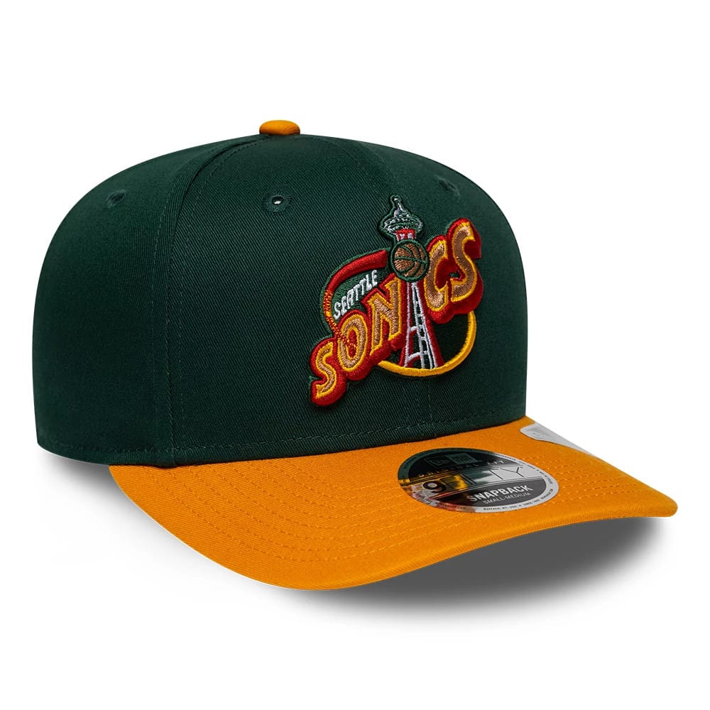 Supersonics NBA Hardwood Classic Green New Era 9FIFTY Snapback Adjustable Cap, three-quarter view showing the Seattle Sonics logo in raised embroidery on the front panel, with an orange flat visor and a 9FIFTY size sticker on the top.