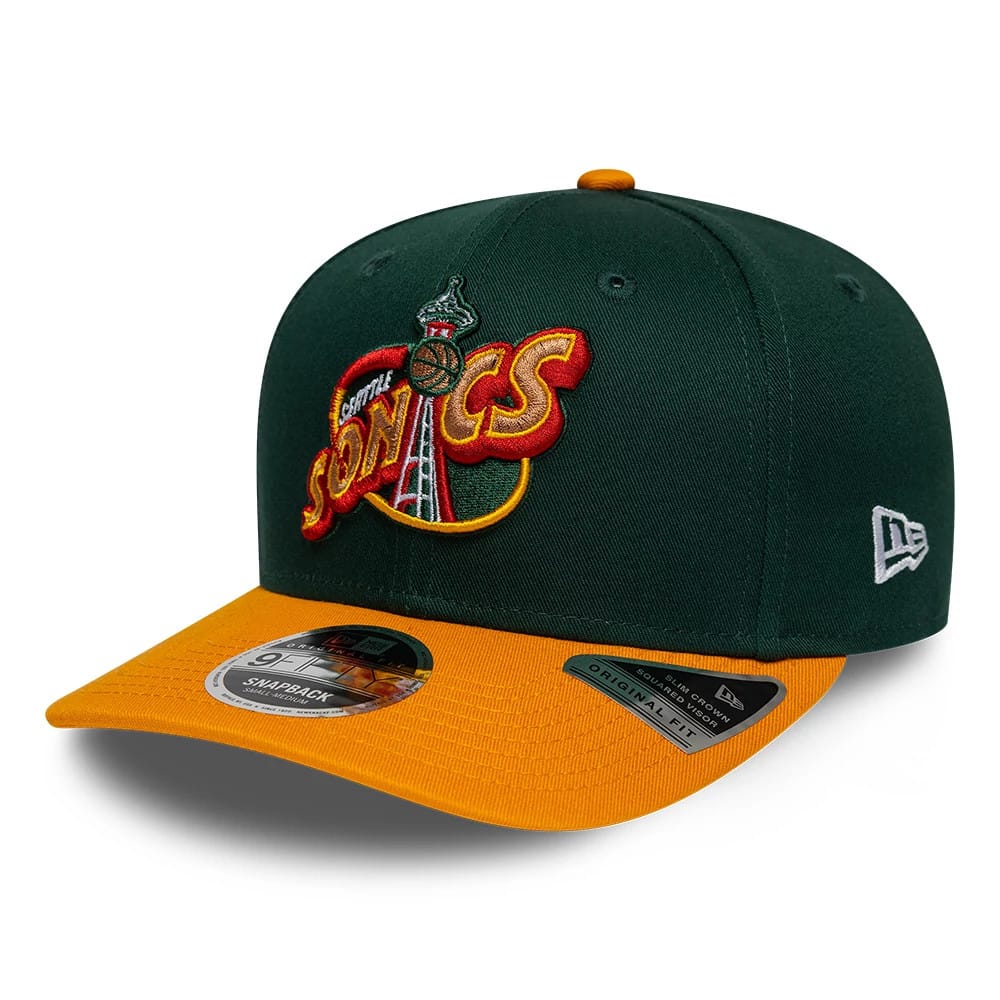 Supersonics NBA Hardwood Classic Green New Era 9FIFTY Snapback Adjustable Cap, three-quarter view showing the yellow and red embroidered logo on the front panel, contrasting yellow visor with a 9FIFTY size sticker.