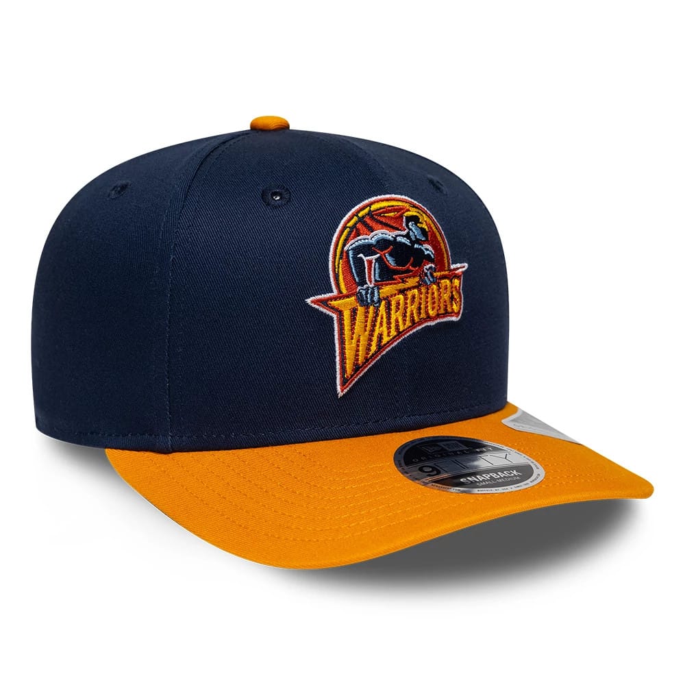 Warriors NBA Hardwood Classic Dark Blue New Era 9FIFTY Snapback Adjustable Cap, three-quarter view showing the orange and blue embroidered Warriors logo on the front panel, complemented by an orange visor.