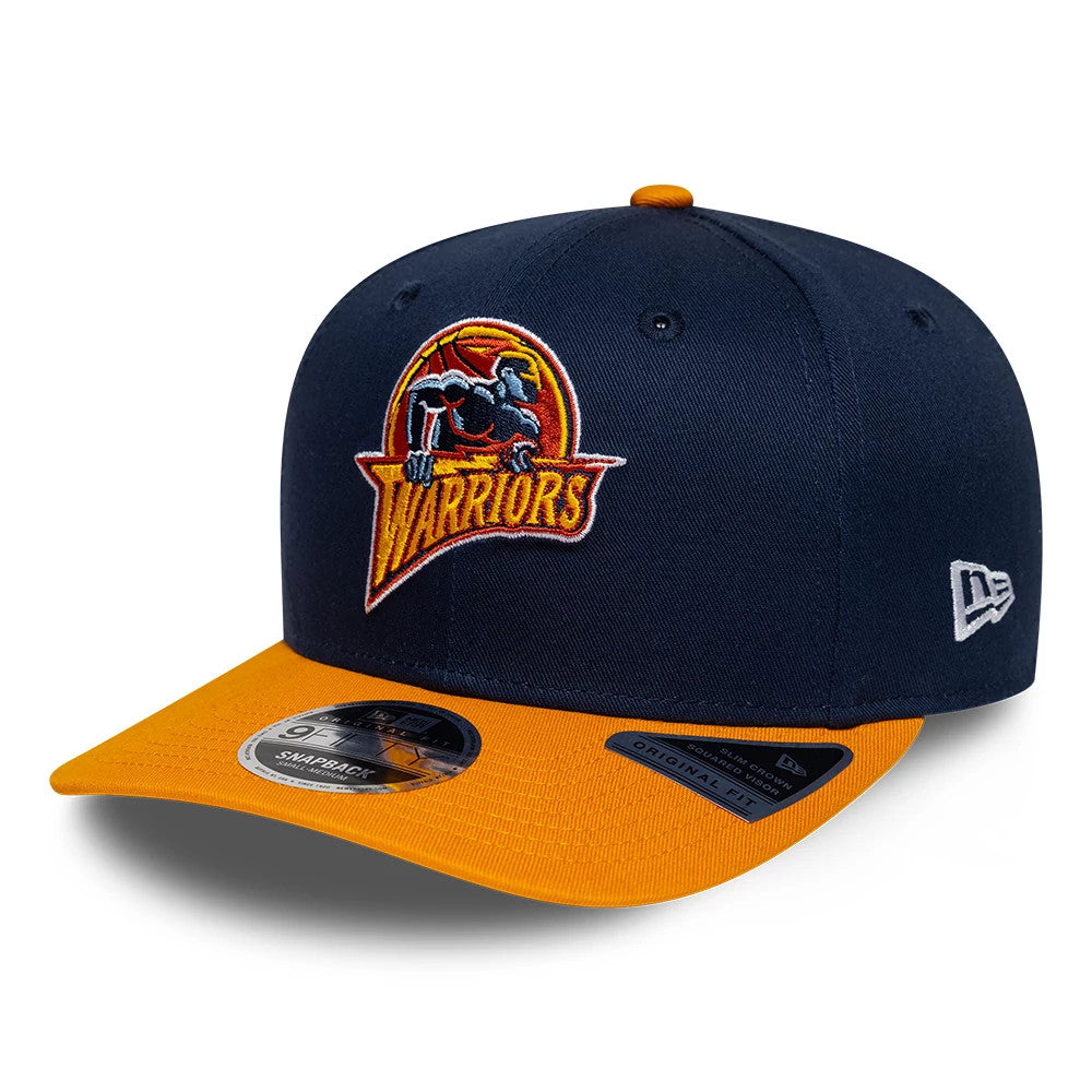 Warriors NBA Hardwood Classic Dark Blue New Era 9FIFTY Snapback Adjustable Cap, front view showing the raised embroidered Warriors logo on the dark blue front panel, with a gold visor and a 9FIFTY size sticker on the visor.