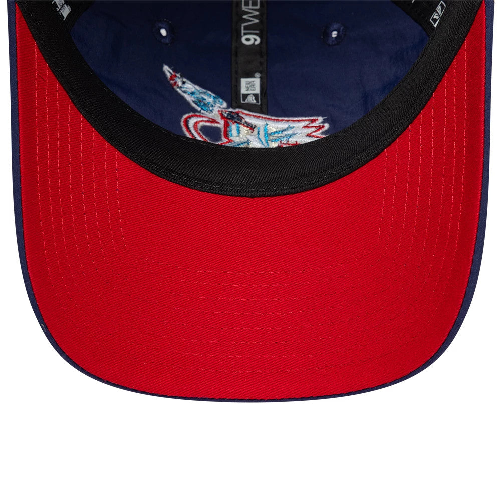 Rockets NBA Hardwood Classic Nylon Dark Blue New Era 9TWENTY Adjustable Cap, inside view showing a red undervisor, black interior taping with a 9TWENTY logo, and a dark blue sweatband, accentuating the embroidered graphic detail under the crown.