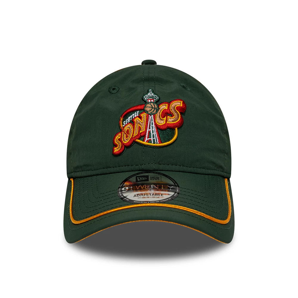 Supersonics NBA Hardwood Classic Nylon Green New Era 9TWENTY Adjustable Cap, front view showing the raised embroidered Sonics logo in red and yellow on the front panel, with a curved visor featuring orange trim and a 9TWENTY size sticker.