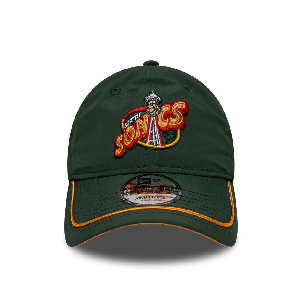 Supersonics NBA Hardwood Classic Nylon Green New Era 9TWENTY Adjustable Cap, front view showing the raised embroidered Sonics logo in red and yellow on the front panel, with a curved visor featuring orange trim and a 9TWENTY size sticker.