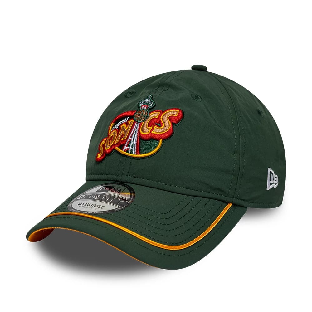 Supersonics NBA Hardwood Classic Nylon Green New Era 9TWENTY Adjustable Cap, three-quarter view showing the embroidered Supersonics logo on the front panel, a curved visor with a gold trim, and the New Era flag logo on the left side.