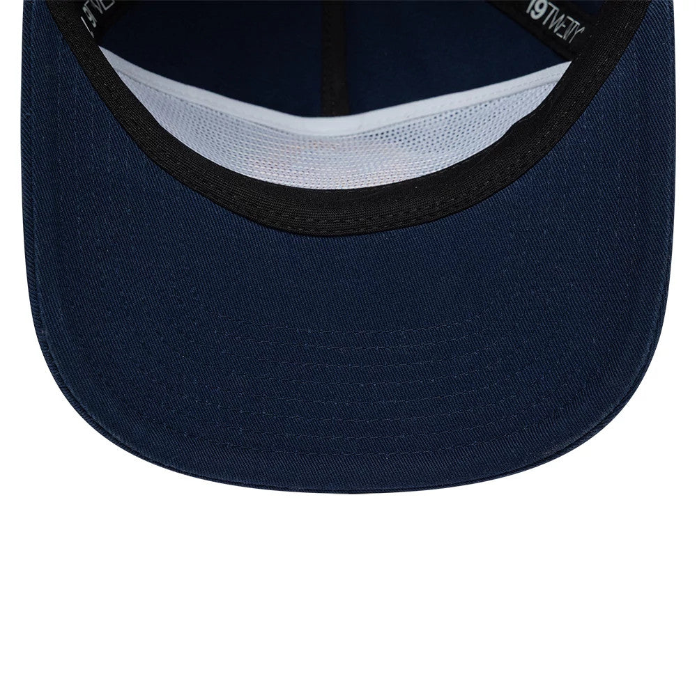 Warriors NBA Hardwood Classic Dark Blue New Era 19TWENTY Adjustable Cap, inside view showing the black sweatband bordering the dark blue undervisor, with white mesh panel lining and 19TWENTY branded taping inside the cap.