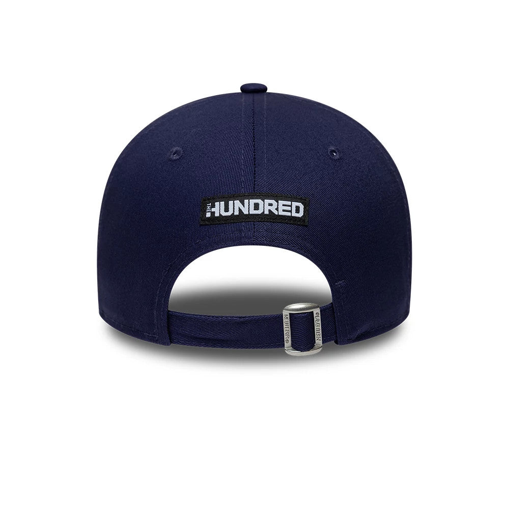 London Spirit The Hundred 2026 Dark Blue New Era 9FORTY Adjustable Cap, rear view showing the embroidered The Hundred logo centred on the dark blue crown above the fabric strap with a buckle, revealing a structured six-panel design.