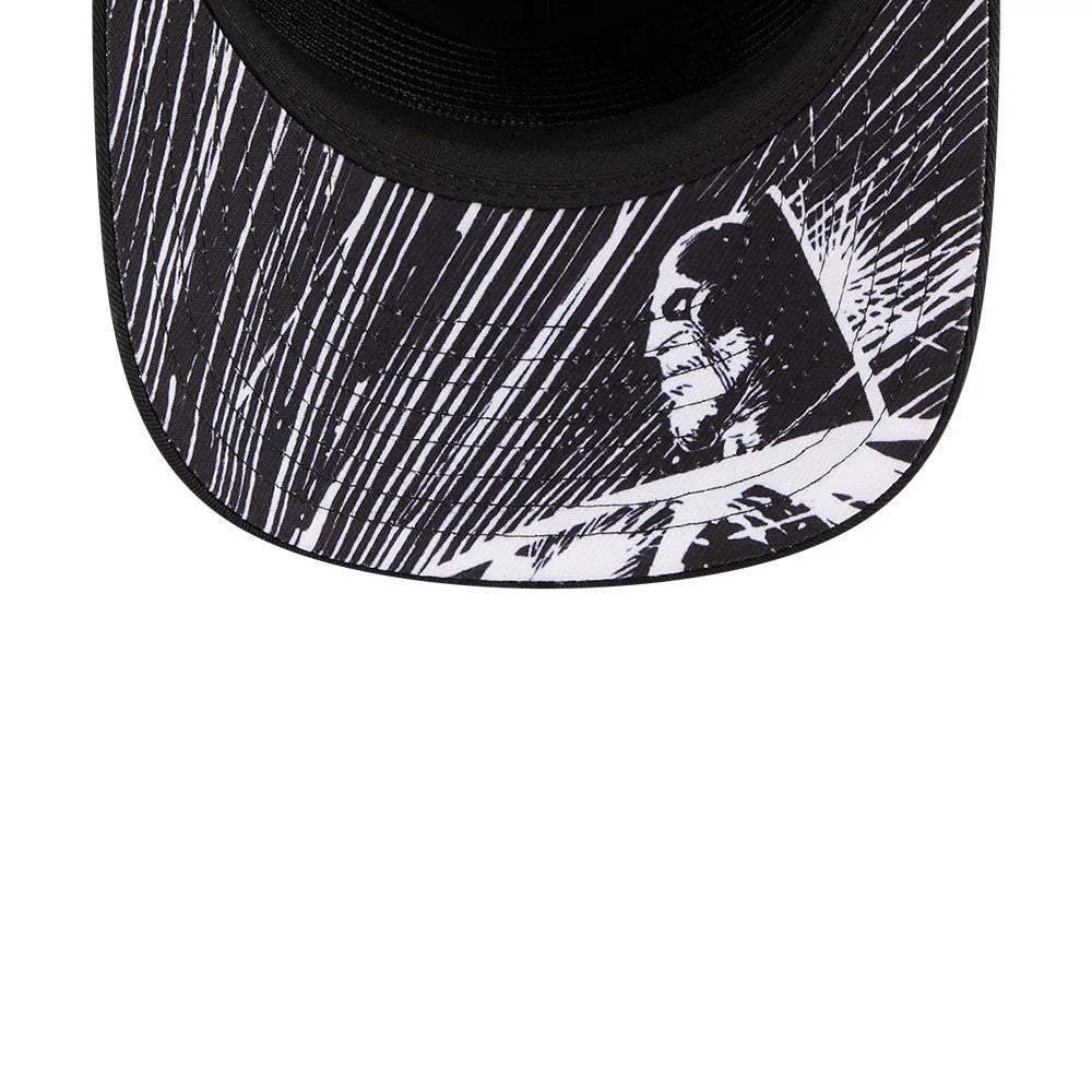 DC Batman Black New Era 19TWENTY Adjustable Cap, close-up showing a monochrome graphic of Batman printed on the curved black visor, with dynamic white lines that create a contrast and enhance the cap's comic book theme.