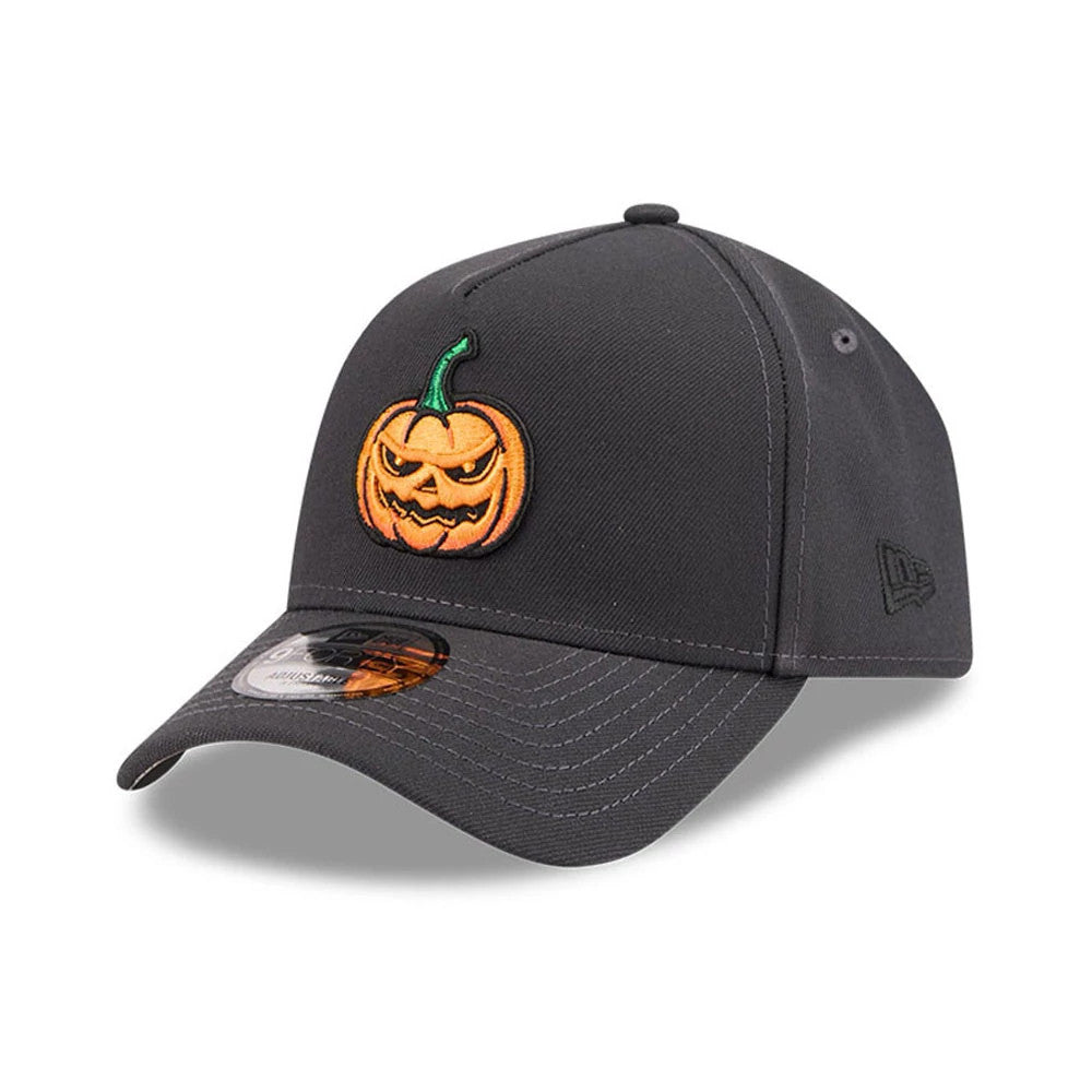New Era Jack O Lantern Black 9FORTY A-Frame Adjustable Cap, three-quarter view showing an orange and green raised embroidered pumpkin on the front panel, a curved black visor with a 9FORTY size sticker, and a New Era flag logo on the left side.
