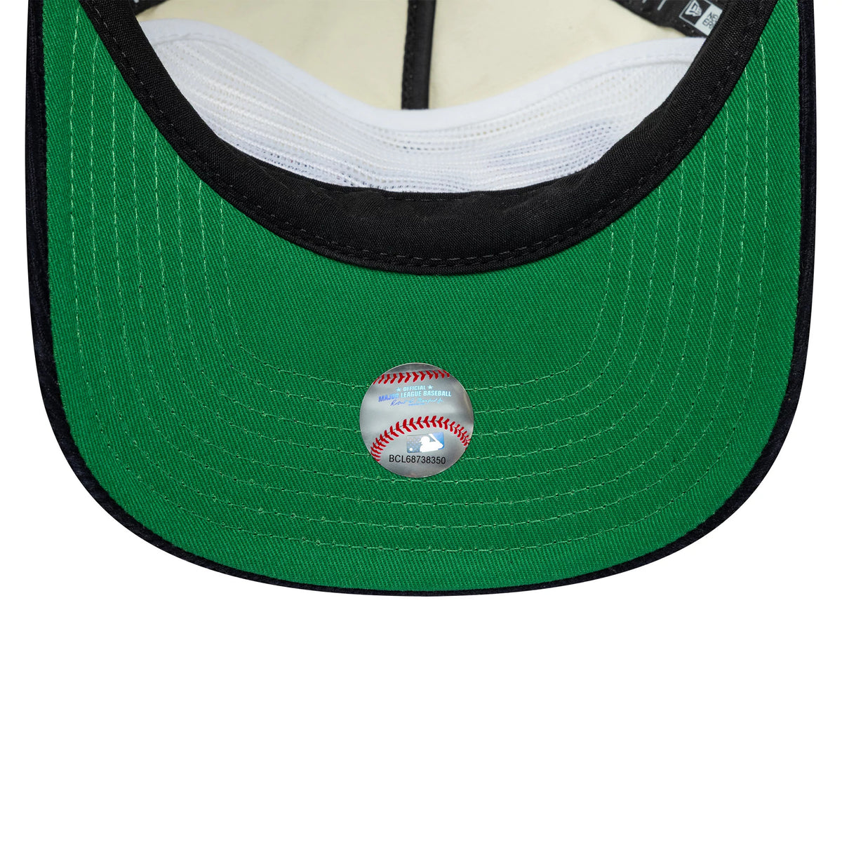 Atlanta Braves MLB Retro Dynasty Cream & Navy New Era 19TWENTY Adjustable Cap, inside view showing the green undervisor centrepiece brown leather sweatband and contrast white taping, with an MLB-themed round sticker placed at the centre.