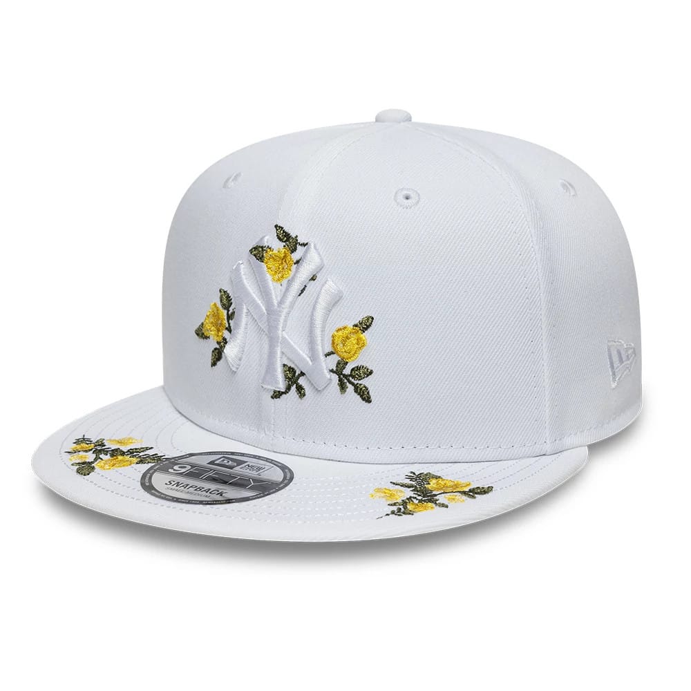 Pictured is this MLB Floral New York Yankees 9FIFTY Snapback cap in white. 1