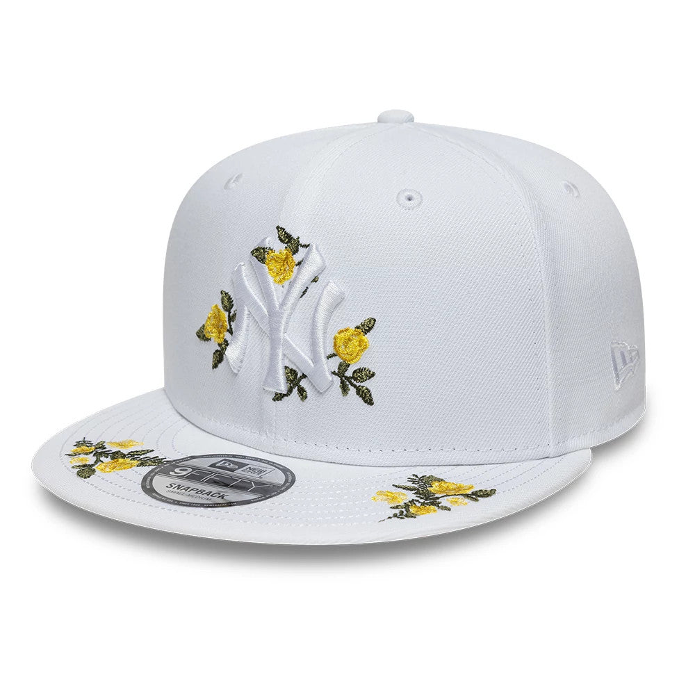 Pictured is this MLB Floral New York Yankees 9FIFTY Snapback cap in white. 1