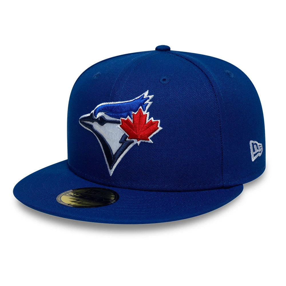 Toronto Blue Jays MLB Cooperstown Blue New Era 59FIFTY Fitted Cap, front view with a white and red embroidered Blue Jays logo on the front panel, matching blue flat visor, New Era flag logo on the left side, and gold 59FIFTY size sticker.