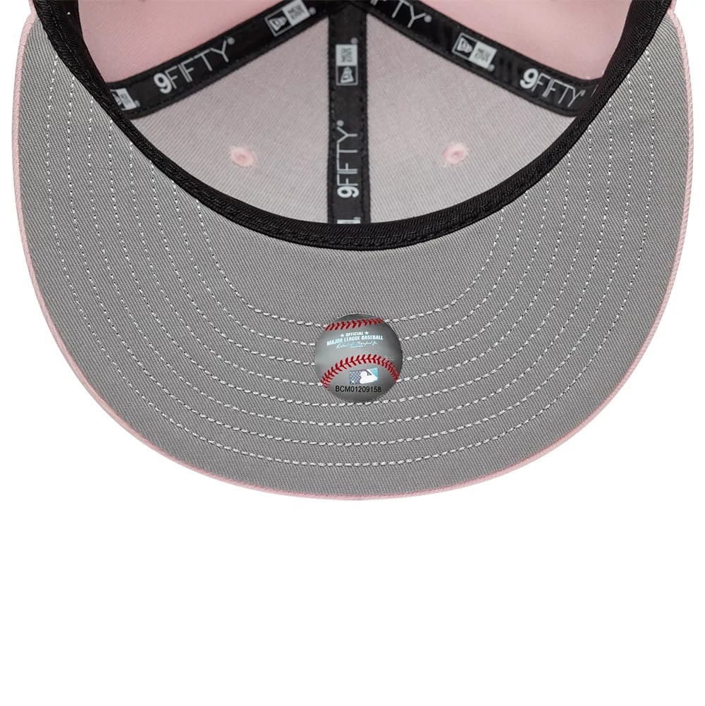 Pictured is this MLB Floral New York Yankees 9FIFTY Snapback cap in pastel pink. 2