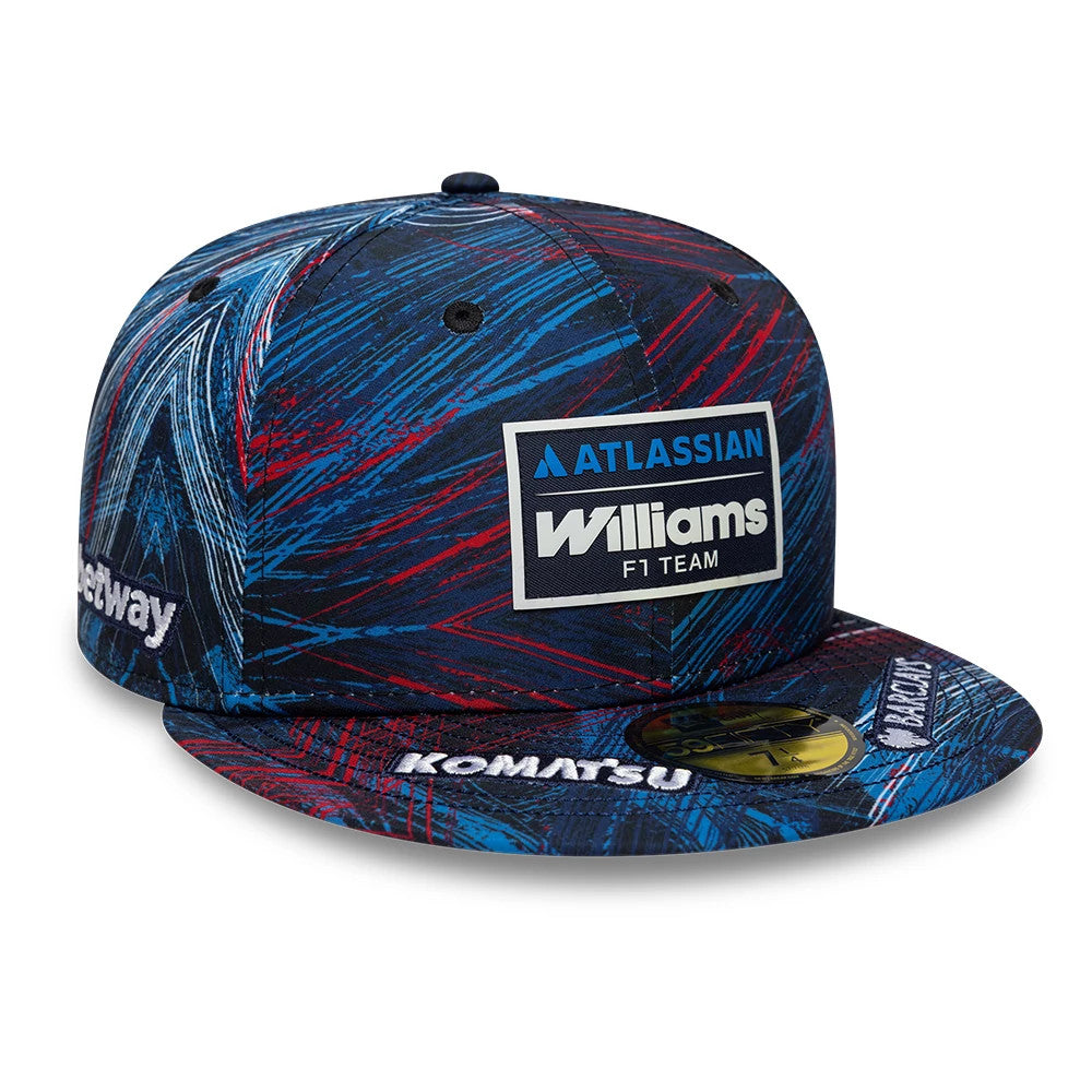 Williams GB Race Special Navy New Era 59FIFTY Fitted Cap, front view showing a raised embroidered Williams F1 Team logo on the front panel, with a navy, red and blue abstract pattern, and a gold 59FIFTY size sticker on the flat visor.