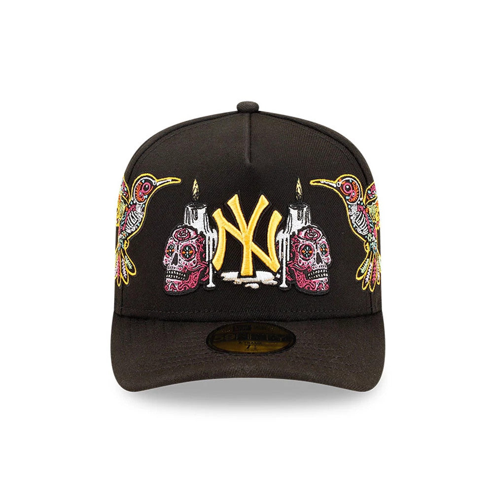 Yankees MLB Day Of The Dead Black New Era 59FIFTY A-Frame Fitted Cap, front view showing yellow Yankees logo embroidery flanked by colourful Day of the Dead motifs including intricate skulls and hummingbirds.