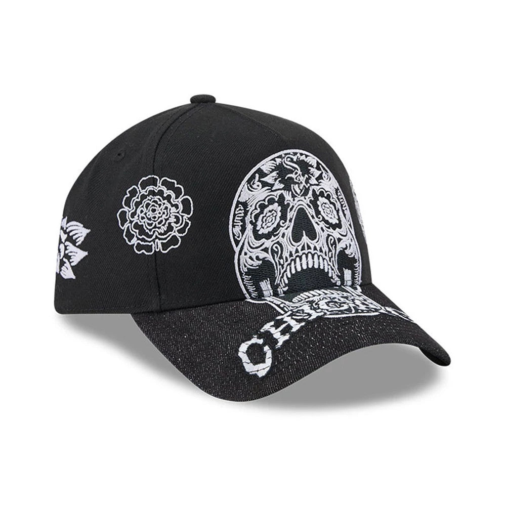 Chicago White Sox MLB Day Of The Dead Black New Era 9FORTY A-Frame Adjustable Cap, three-quarter view showing a detailed white embroidered skull on the front panel, floral accents on the sides, and Chicago text on the black curved visor.