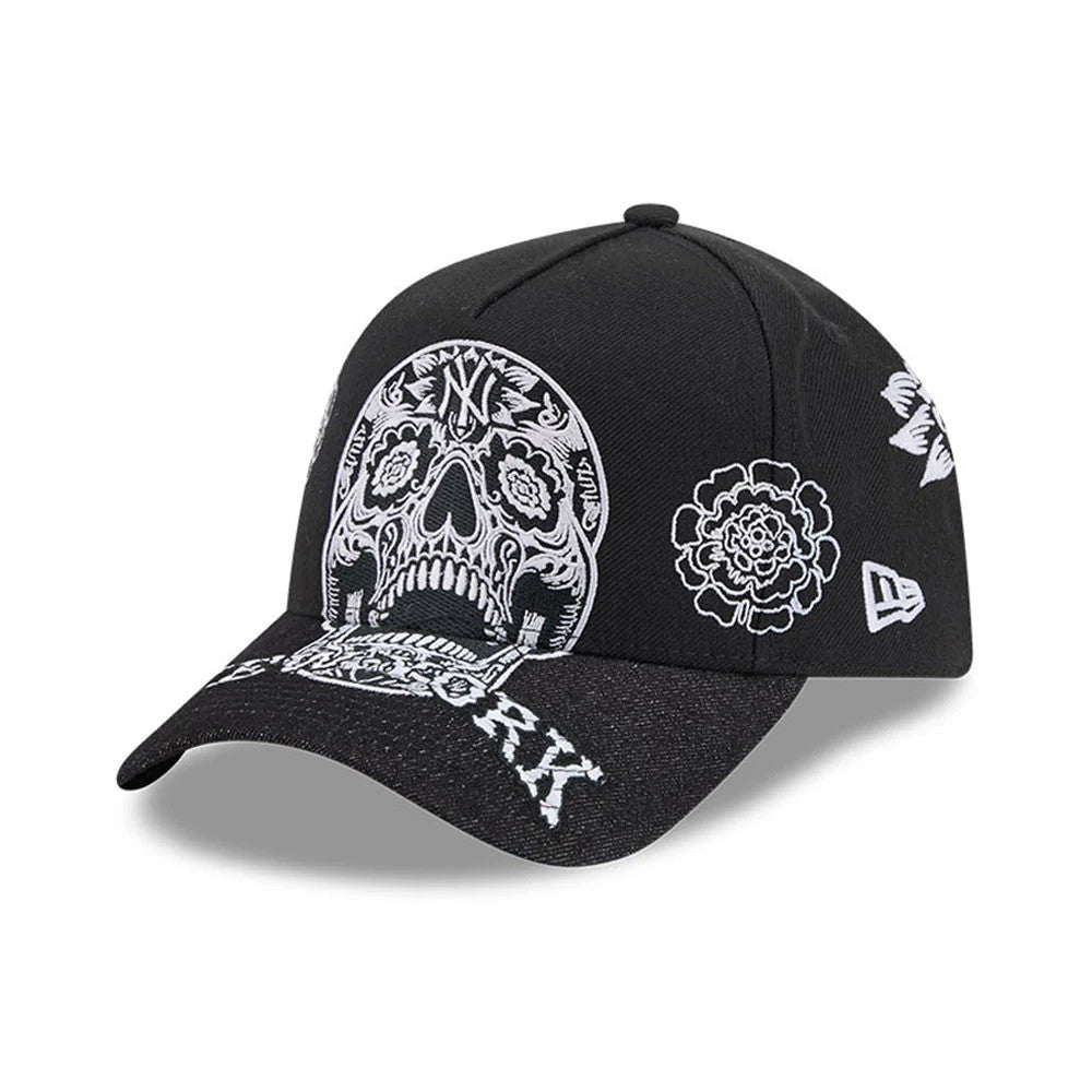 New York Yankees MLB Day Of The Dead Black New Era 9FORTY A-Frame Adjustable Cap, three-quarter view showing white skull and flower embroidery on the structured black crown, New Era flag logo on the left side.