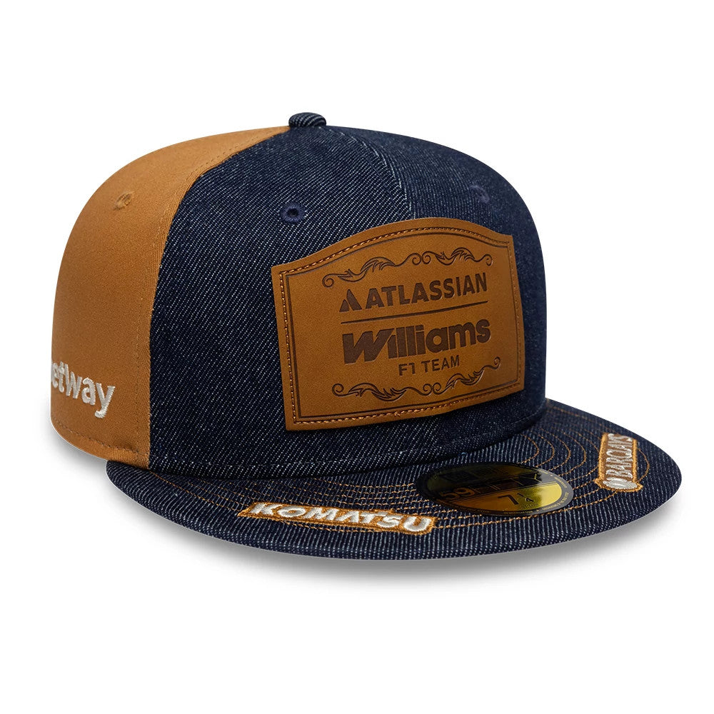 Williams Team Austin Race Special Navy New Era 59FIFTY Fitted Cap, front view showing a brown leather patch with embroidered Williams F1 Team logo, denim-style navy front panel with contrasting brown side panels.