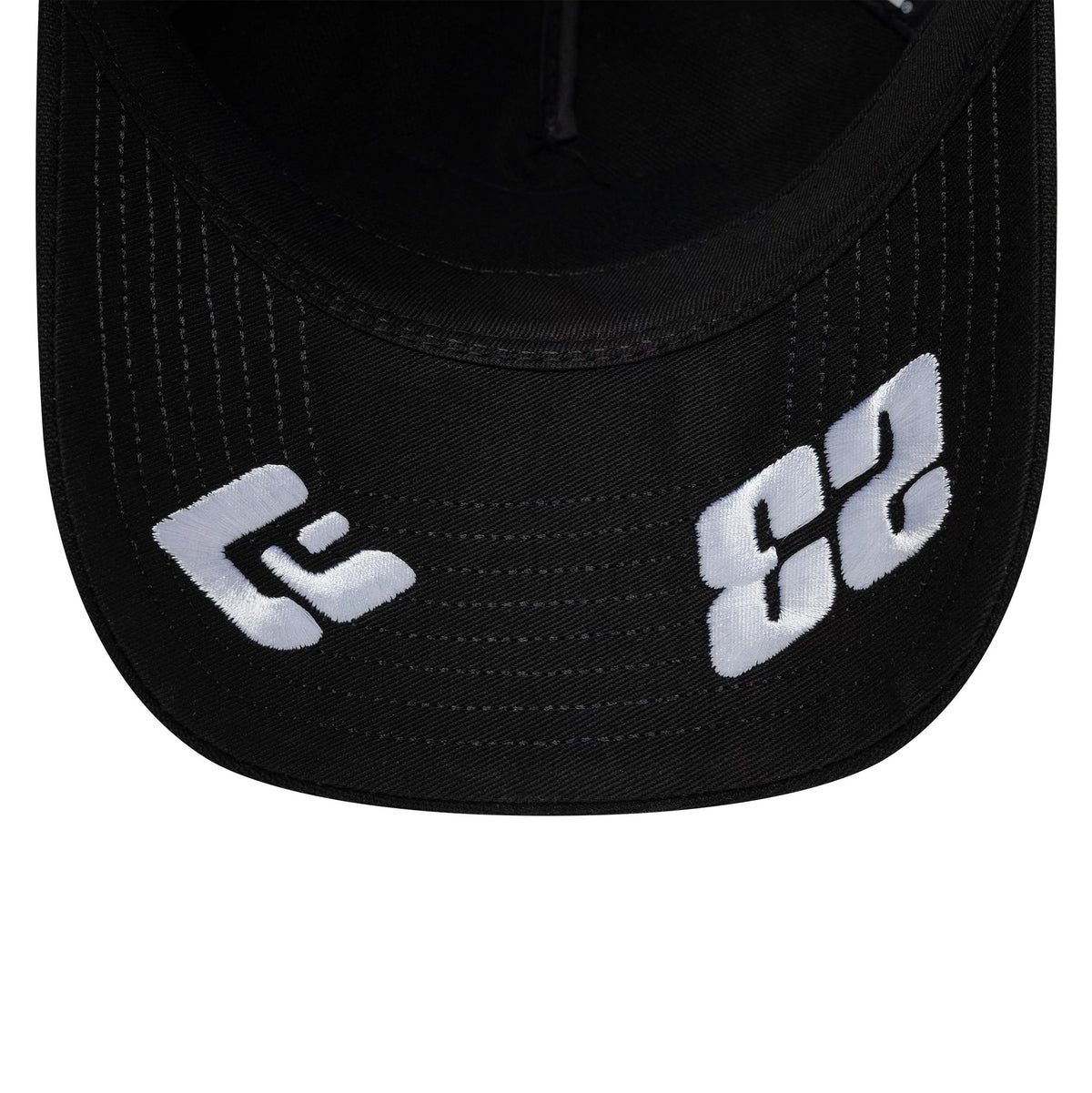 Williams Alex Albon Vegas Race Special Black New Era 9TWENTY A-Frame Adjustable Cap, inside view showing a black undervisor with a flat black interior, accented by white embroidered logos on the left and right side.