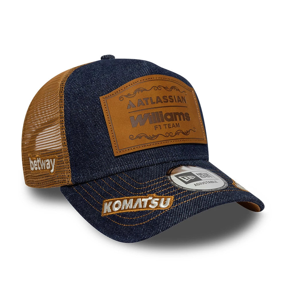 Williams Alex Albon Austin Race Special Navy New Era 9FORTY E-Frame Trucker Adjustable Cap, three-quarter view showing a brown embroidered Williams F1 Team patch on the front panel, mesh side panels with betway text.
