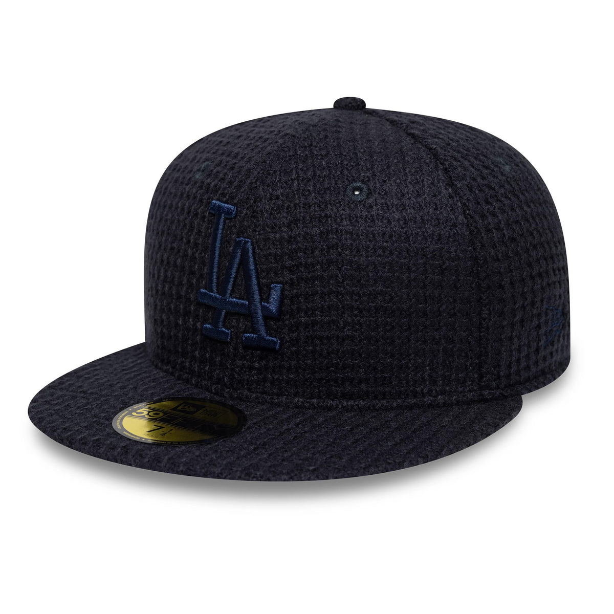 Pictured is this MLB Knitted LA Dodgers 59FIFTY Fitted cap in navy. 1