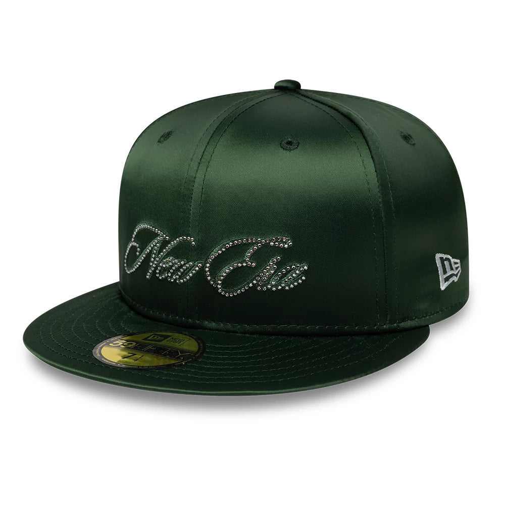 New Era Satin Diamante Dark Green New Era 59FIFTY Fitted Cap, three-quarter view showing the diamante-embellished New Era script logo on the structured dark green crown, flat visor with a gold 59FIFTY size sticker.