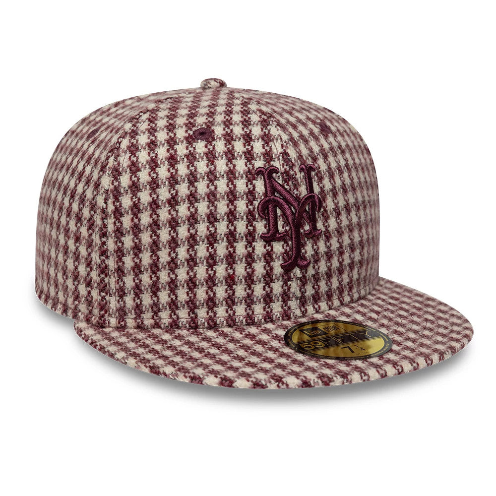 New York Mets MLB Houndstooth Dark Purple New Era 59FIFTY Fitted Cap, three-quarter view showing the raised dark purple NY logo embroidered on the front panels, with a matching houndstooth pattern covering the structured crown and flat visor.