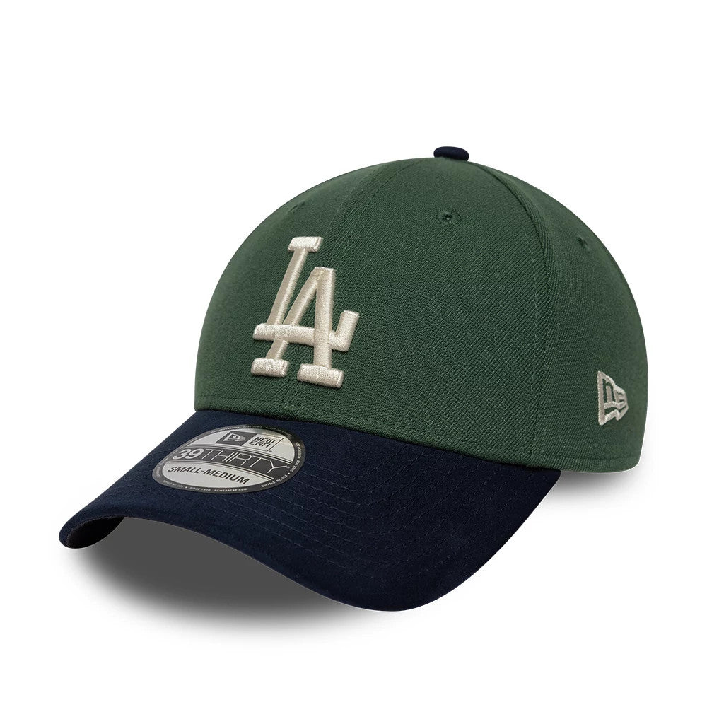LA Dodgers MLB Faux Suede Dark Green & Navy New Era 39THIRTY Stretch Fit Cap, front view showing the white raised embroidered LA logo centred on the structured dark green crown, with a navy curved visor and a 39THIRTY size sticker.