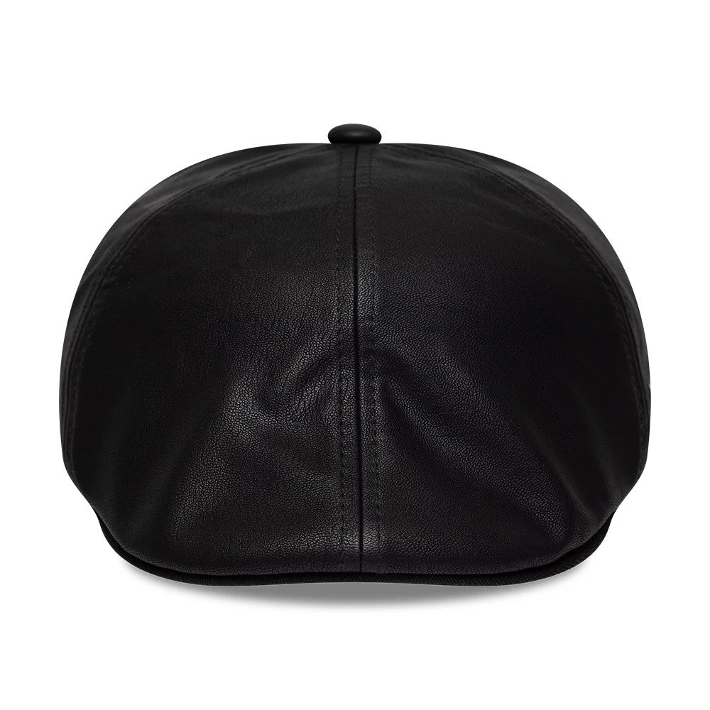New Era PU Black Duckbill Cap, front view showing the black faux leather material with a seamless design, a structured crown with stitching, and a rounded top button accentuating its classic duckbill silhouette.