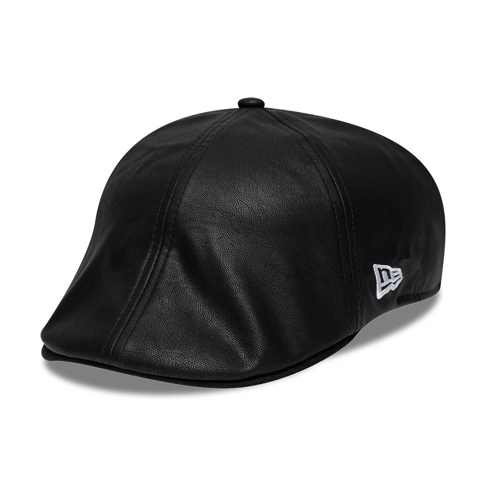 New Era PU Black Duckbill Cap, three-quarter view showing the synthetic leather texture, a black visor, and the white embroidered New Era flag logo on the left side of the structured crown.