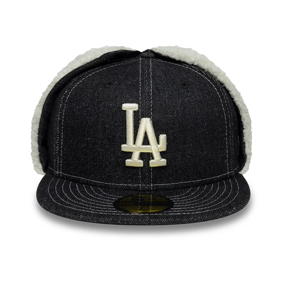 LA Dodgers MLB Denim Black Dogear New Era 59FIFTY Fitted Cap, front view showing the raised embroidered white LA logo on the black denim front panel, with contrasting white topstitching and a gold 59FIFTY size sticker on the flat visor.