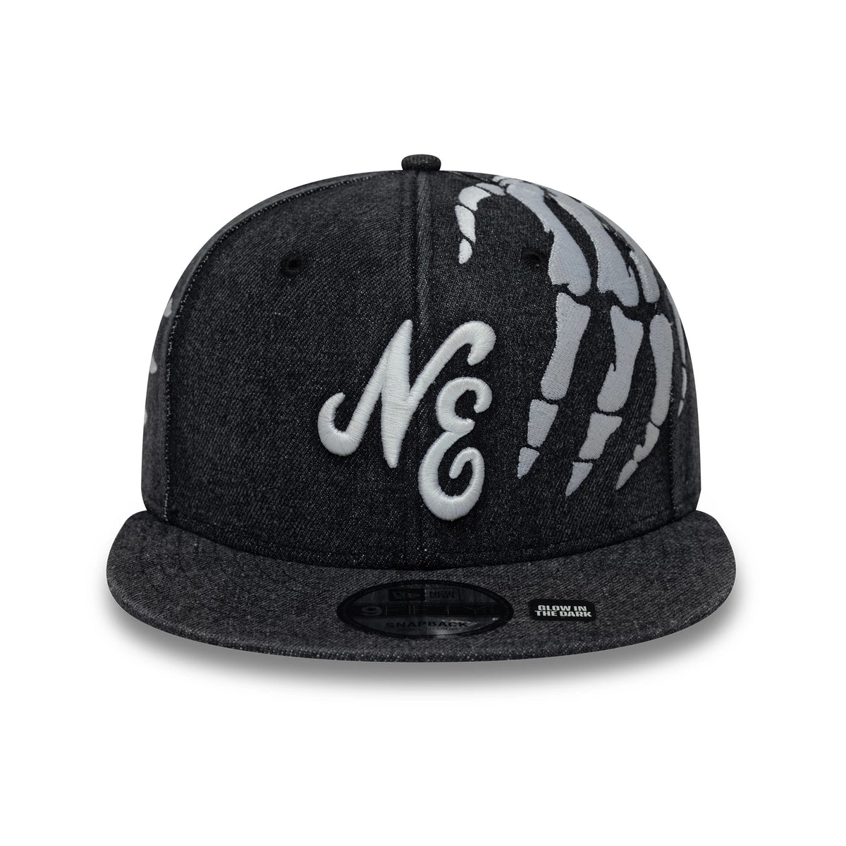 New Era Halloween Glow In The Dark Hands Black 9FIFTY Snapback Adjustable Cap, front view showing a white embroidered NE logo on the centre front panel, a glow-in-the-dark skeletal hand design reaching over the black crown.