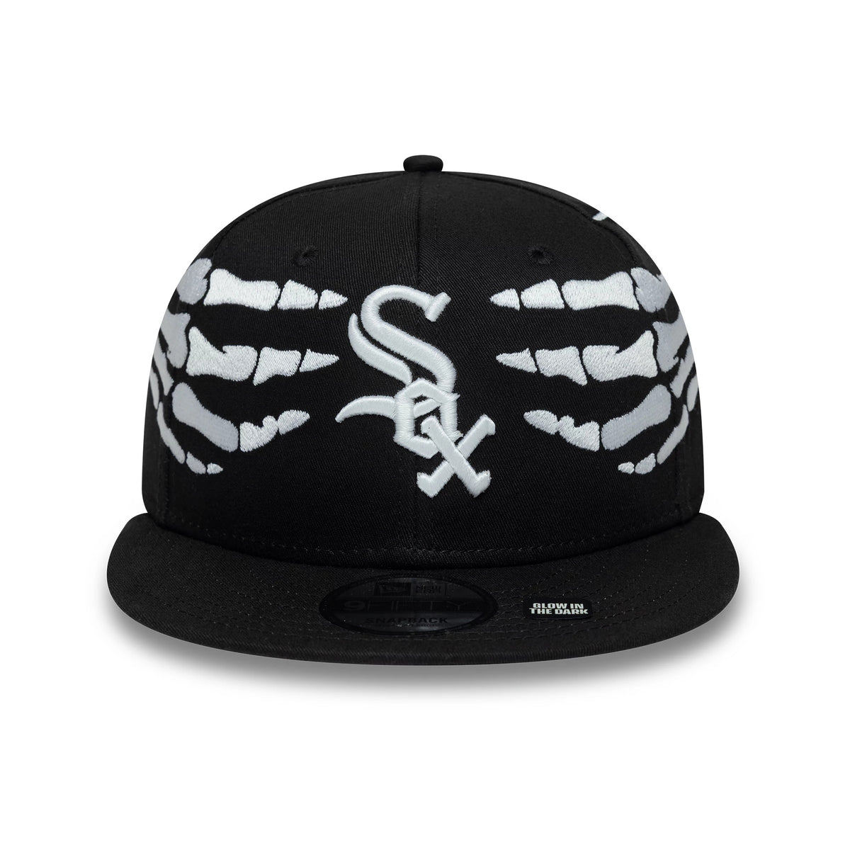 White Sox MLB Halloween Glow In The Dark Hands Black New Era 9FIFTY Snapback Adjustable Cap, front view showing white skeleton hand graphics embroidered on either side of the raised White Sox logo on the black structured crown.