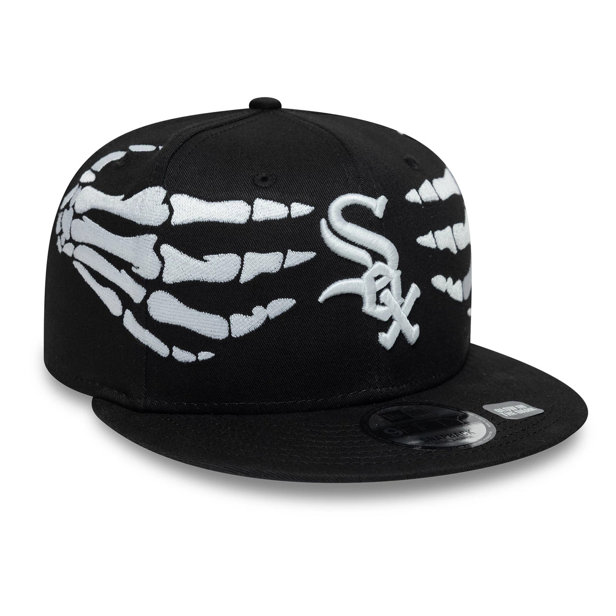 White Sox MLB Halloween Glow In The Dark Hands Black New Era 9FIFTY Snapback Adjustable Cap, front view showing the raised white embroidered White Sox logo on the black crown, with skeletal hands design across the panels.