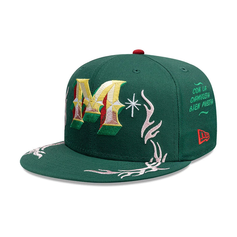 New Era Mexico Rotulos Green 59FIFTY Fitted Cap, front view showing a large embroidered yellow, red, and green M on the front panel, pink flame patterns on the visor and crown, and the red New Era flag logo on the left side.