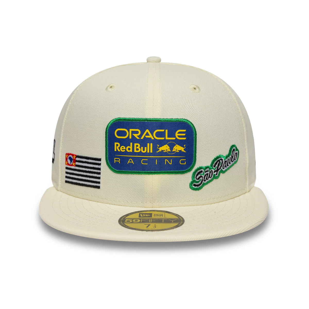 Red Bull Racing Brazil Race Special Cream New Era 59FIFTY Fitted Cap, front view showing an embroidered Oracle Red Bull Racing logo in blue and yellow on the centre front panel, a São Paulo script logo in green and cream.